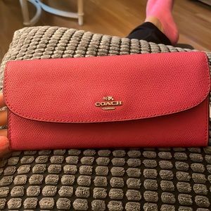NWT Coach wallet in magenta